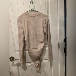 Super soft cream body suit